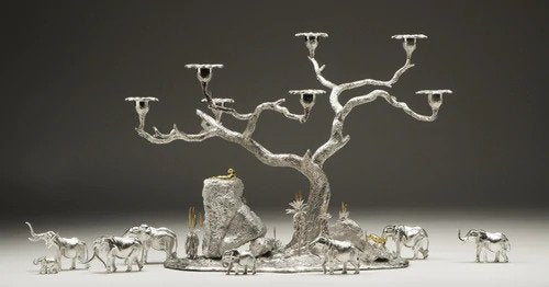 A bespoke table centerpiece replicating the flora and fauna of a private game reserve.