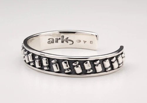 Commissioned by ARK, a limited edition series of bangles in Sterling Silver and 18 carat yellow gold.
