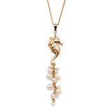 Seahorse Necklace in 18K Gold with a cluster of Pearls