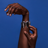 Pangolin Quen Cuff in Sterling Silver shown where to be worn on the arm