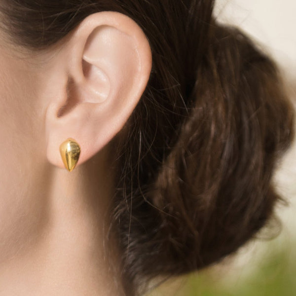 Model Wearing Pangolin Scale Stud Earrings in 18K Gold