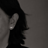 Vakadzi Stud Earrings in Silver by Patrick Mavros