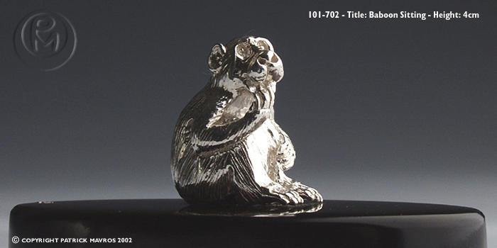 Baboon Sitting Miniature in Sterling Silver on Zimbabwean Blackwood base