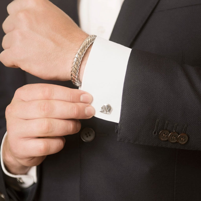 Model Wearing Mixed Cufflinks in Sterling Silver and Pangolin Armour Bangle in Sterling Silver