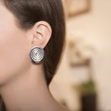 Model Wearing Ndoro Stud Earrings in Sterling Silver - Large