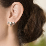 Model Wearing Pangolin Crescent Earrings in Sterling Silver