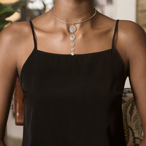 Model Wearing Ndoro Graduated Pendant with Sterling Silver Wire Choker